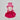 Pink dog dress with a patterned hood on a light gray background